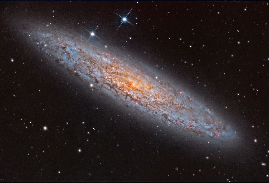 APOD: 2024 February 15 – NGC 253: Dusty Island Universe