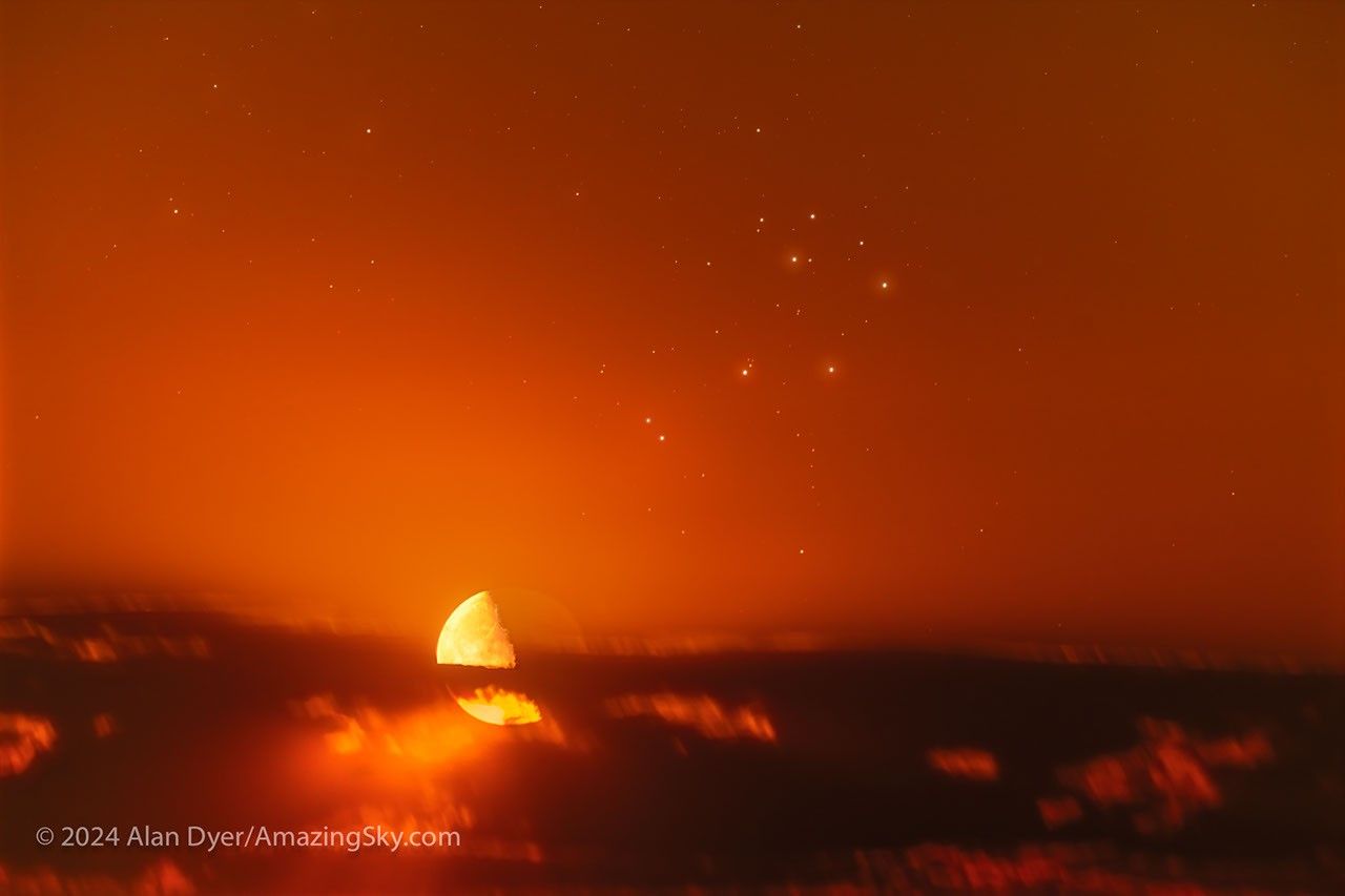 The featured image shows an orange sky with clouds across the bottom and several bright stars near the top center. Just at the top of the cloud deck on the left is a half-lit Moon. Please see the explanation for more detailed information.