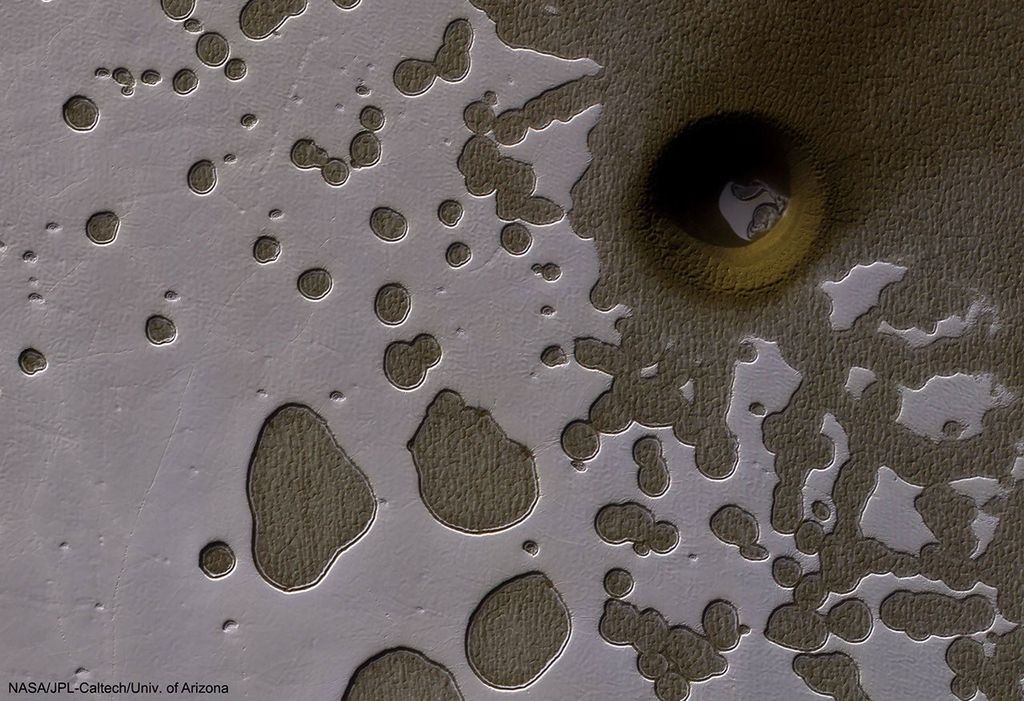 APOD: 2025 April 13 – An Unusual Hole in Mars