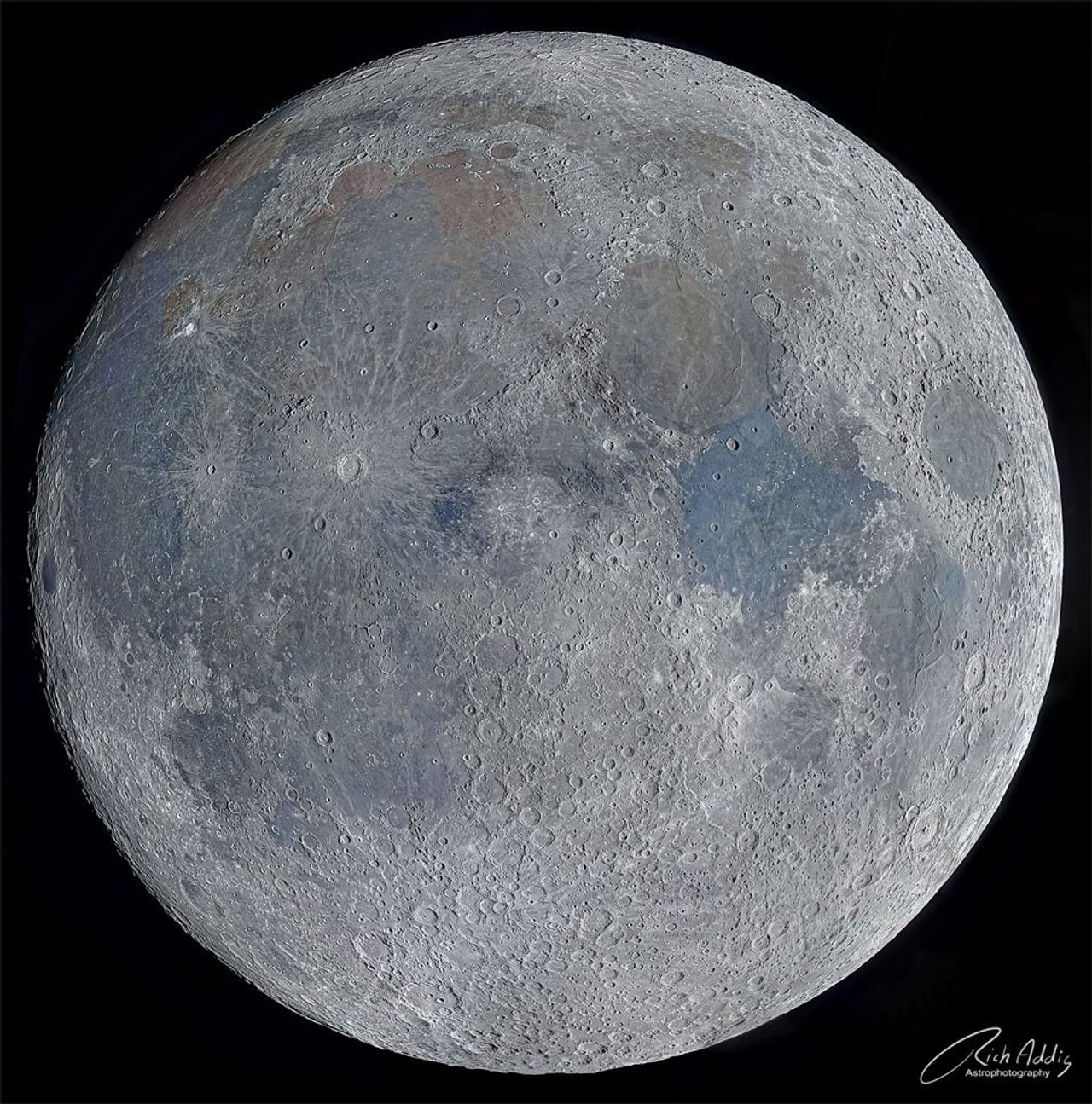 A full Moon is shown but with a much more detailed surface than is usually visible. Many craters, dark lunar mare, and light lunar highlands are discernable. Please see the explanation for more detailed information.