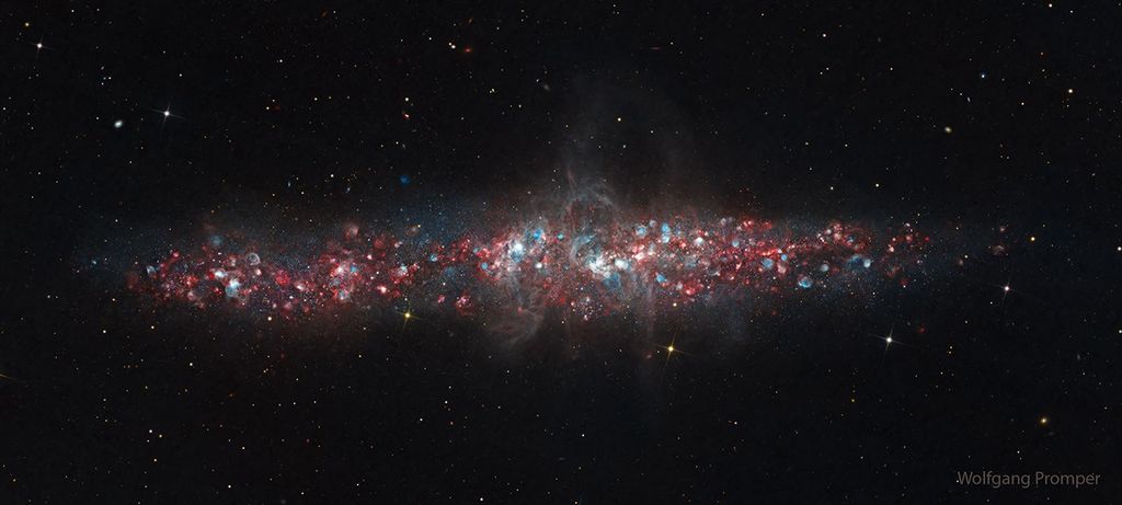 APOD: 2026 January 26 – NGC 55: A Galaxy of Nebulas