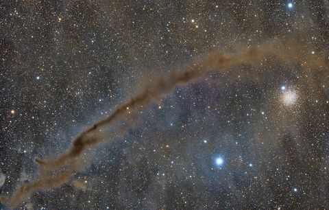 A telescopic image of a dark nebula.