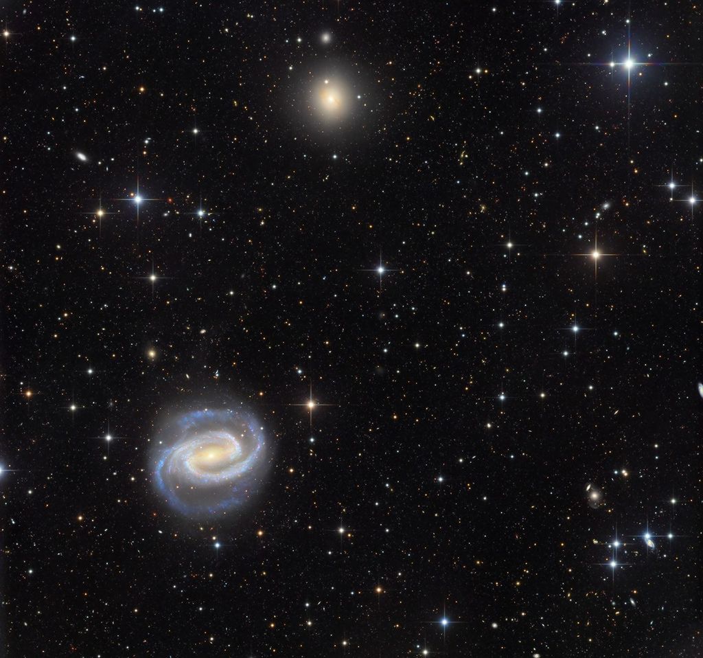 APOD: 2026 March 21 – Galaxies in the River: NGC 1300 and NGC 1297