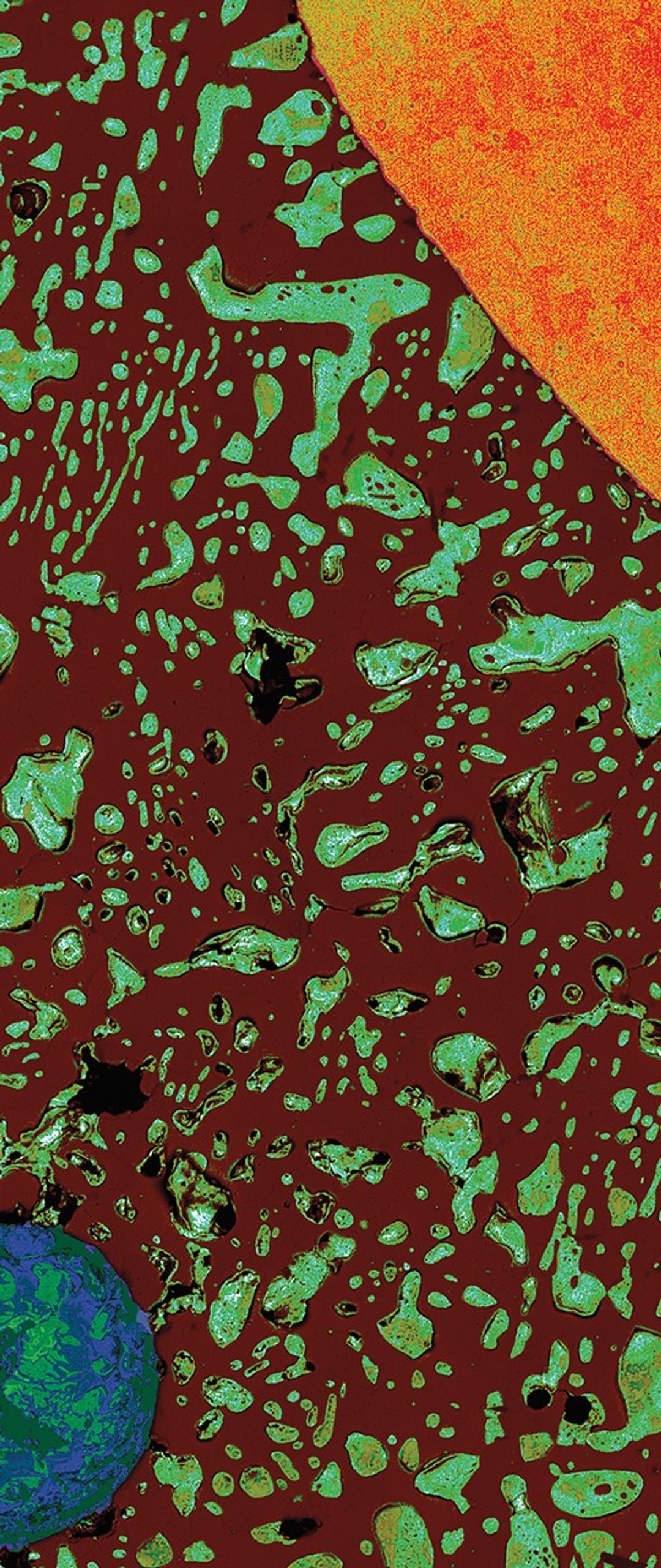 Microscopic cross-section of a solder bead showing a copper wire (orange, upper left) and void (blue-green circle, lower right) surrounded by dark brown and greenish-blue solder material, resembling a solar system with the wire as the sun and void as Earth.