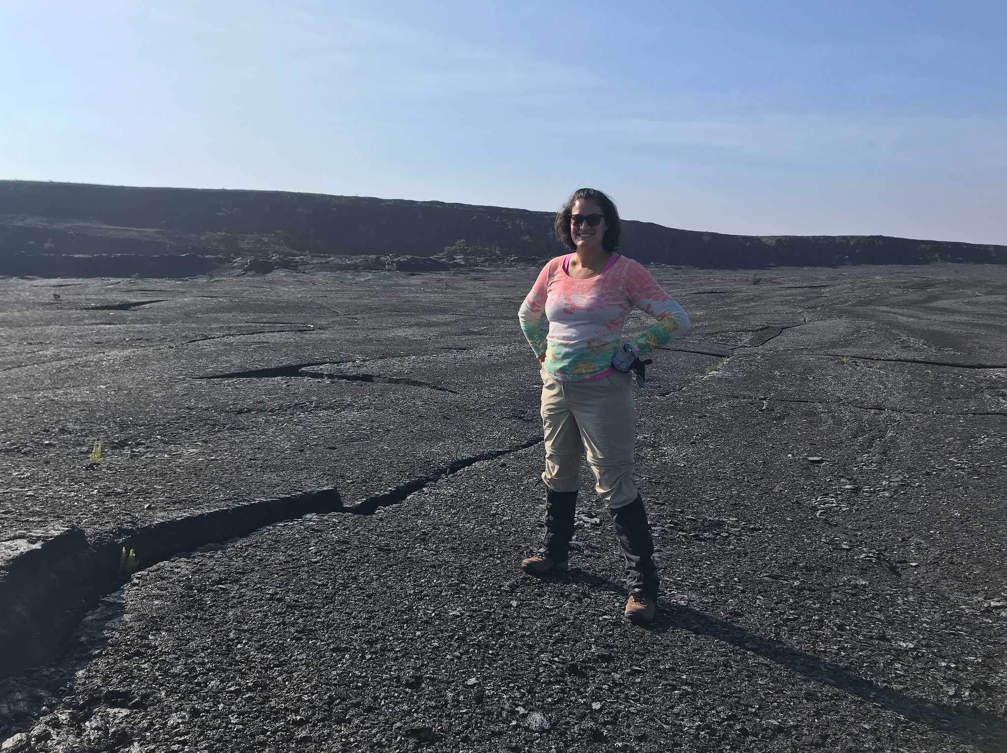 Dr. Santiago-Materese on a rocky surface in Hawaii.