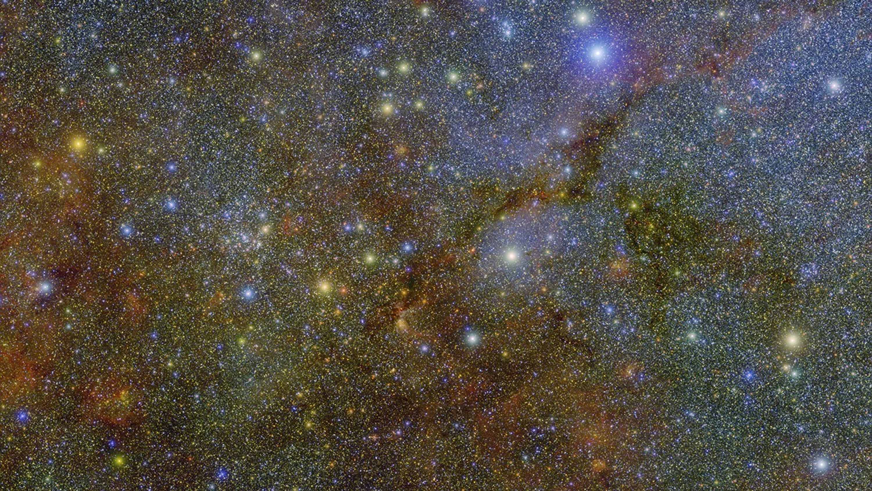 Una observación realizada por SPHEREx de la NASA muestra las firmas químicas de hielo de agua e hidrocarburos aromáticos policíclicos en Cygnus X, una de las regiones de nacimiento de estrellas más activas y turbulentas de nuestra galaxia, la Vía Láctea.