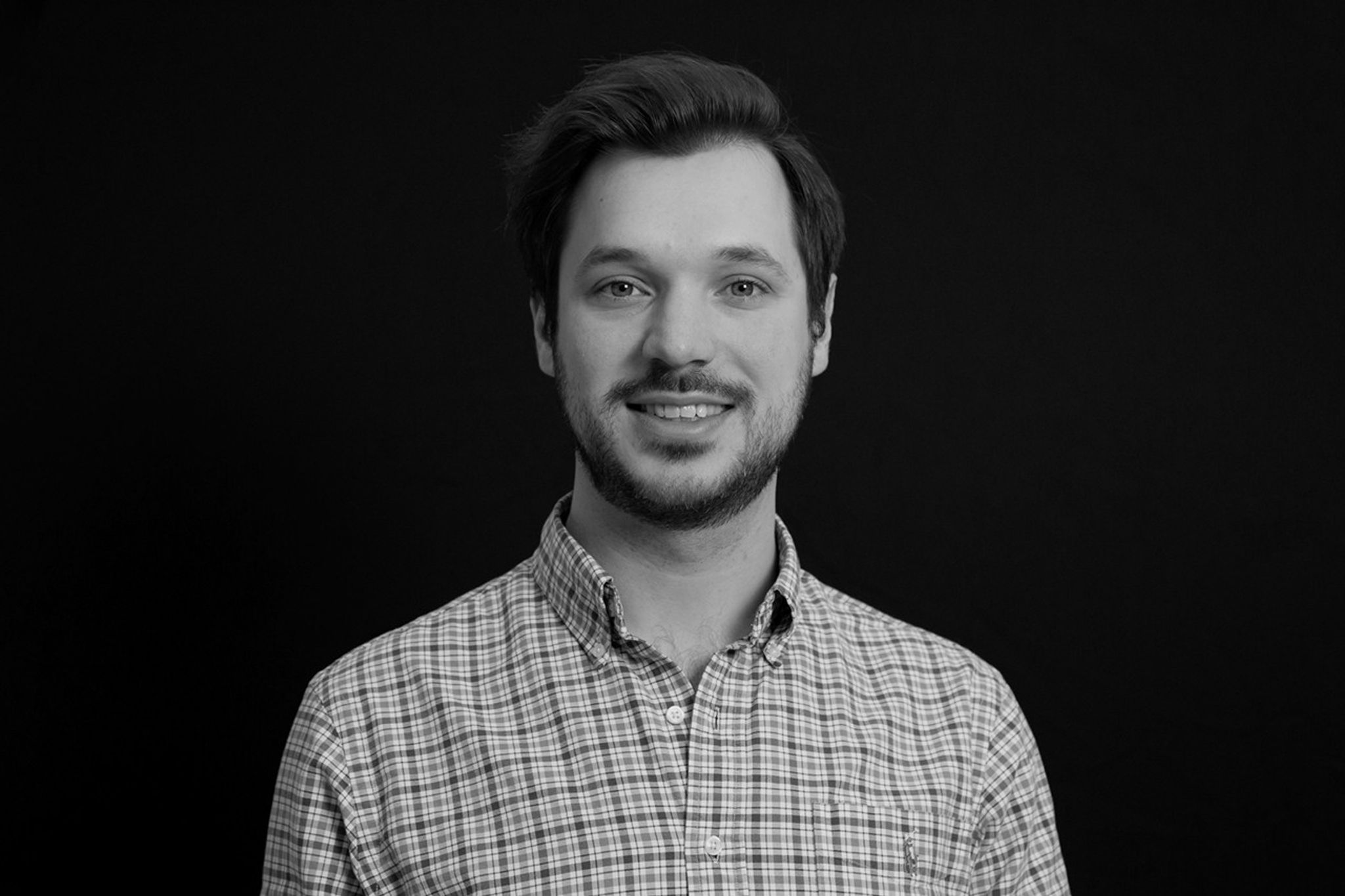 Portrait photo of a  bearded man