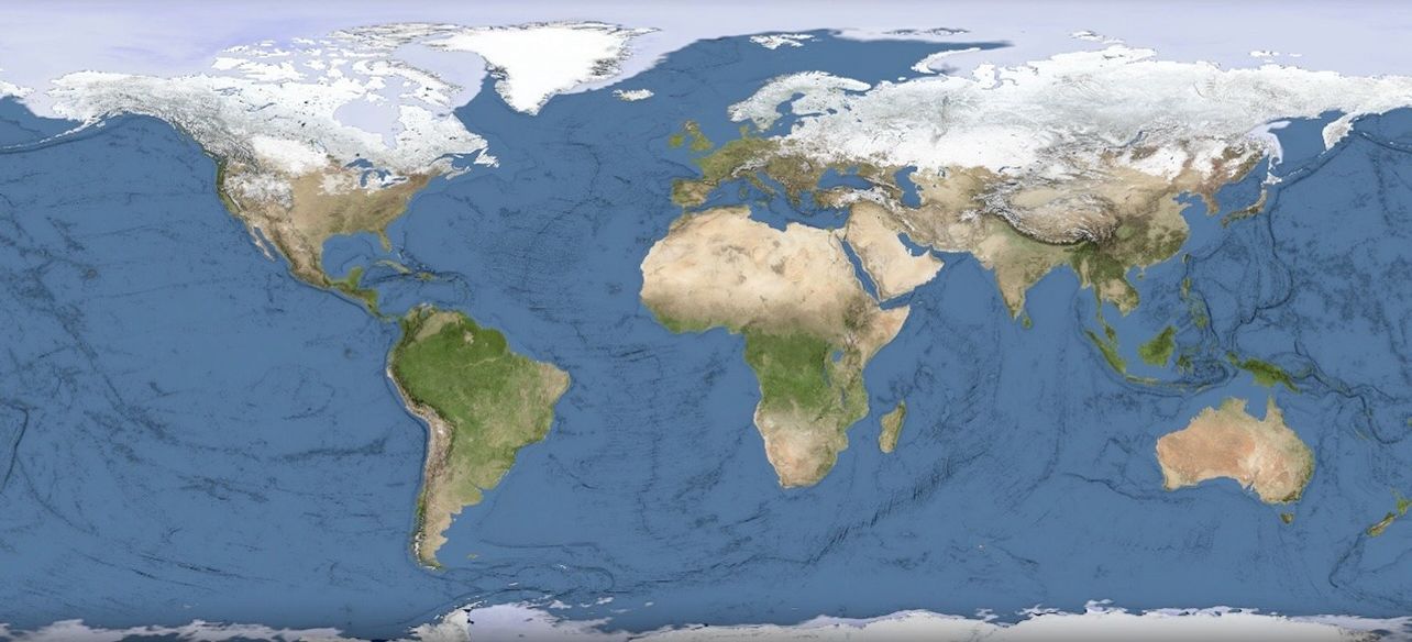 Global map showing land, oceans, and polar sea ice coverage with extensive ice across the Arctic and Northern Hemisphere in winter.