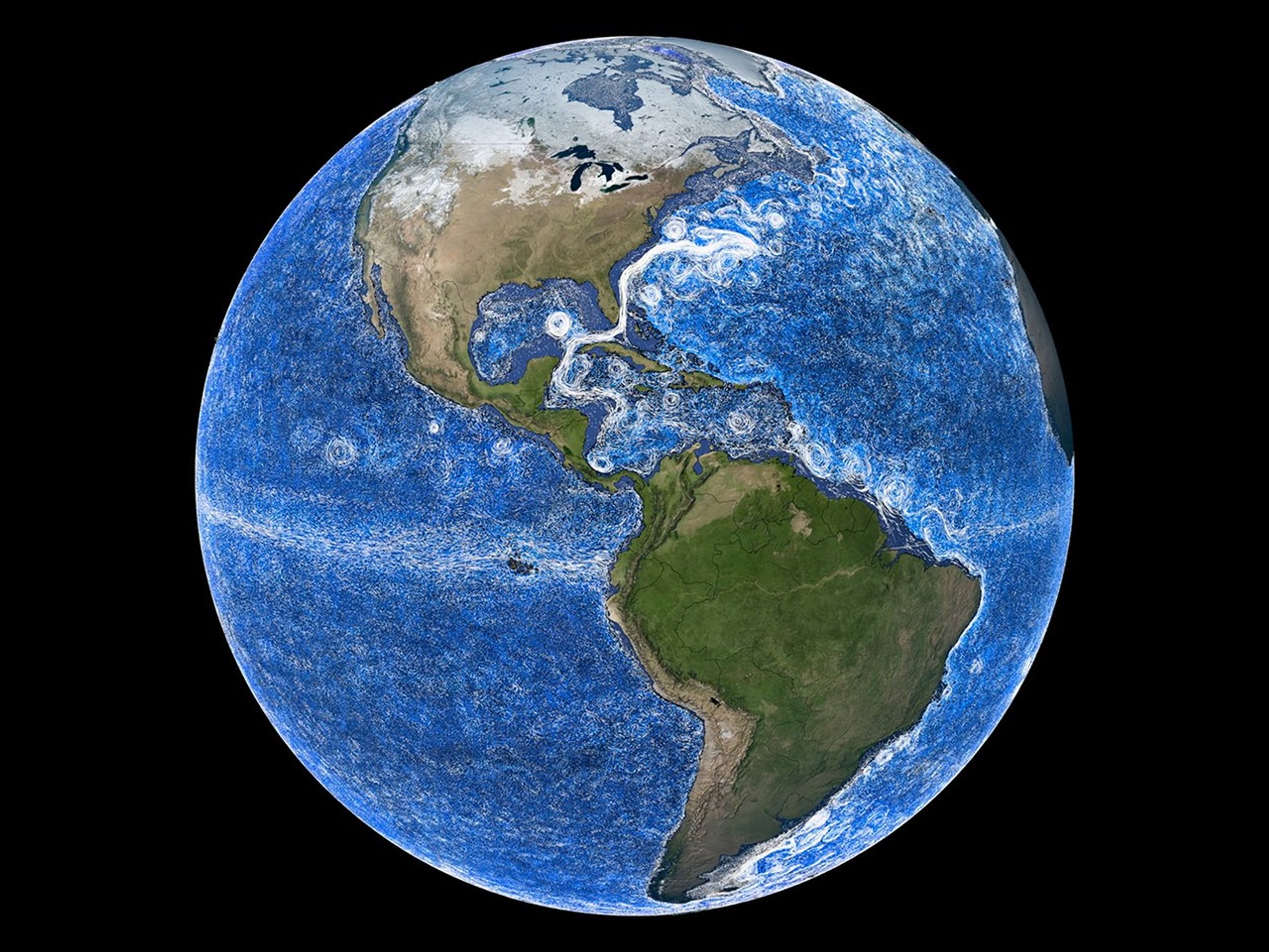 View of Earth from space focused on the Americas, showing swirling ocean currents across the Atlantic and Pacific Oceans in white against a blue ocean background, highlighting global ocean circulation patterns.