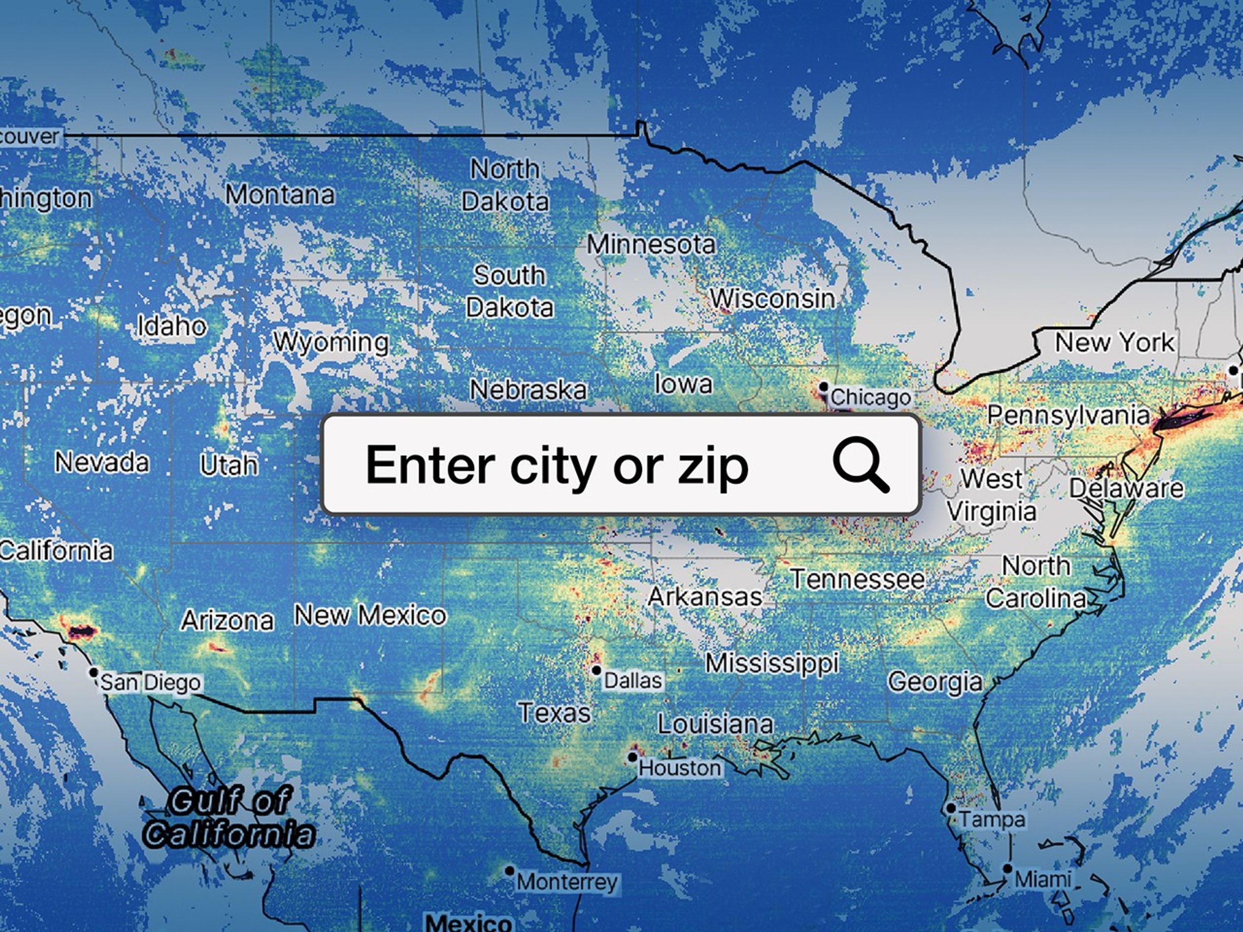 Map of the United States displaying air quality data, with color-coded concentrations of pollutants. A large search bar in the center reads 'Enter city or zip.' High pollution areas appear in red and yellow, while cleaner areas are shown in blue.