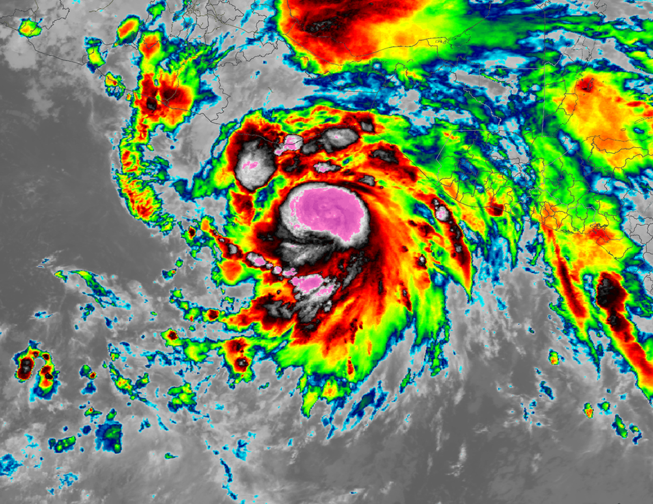 A false-color image from orbit about southwestern Mexico and the Pacific Ocean of Hurricane Erick approaching.