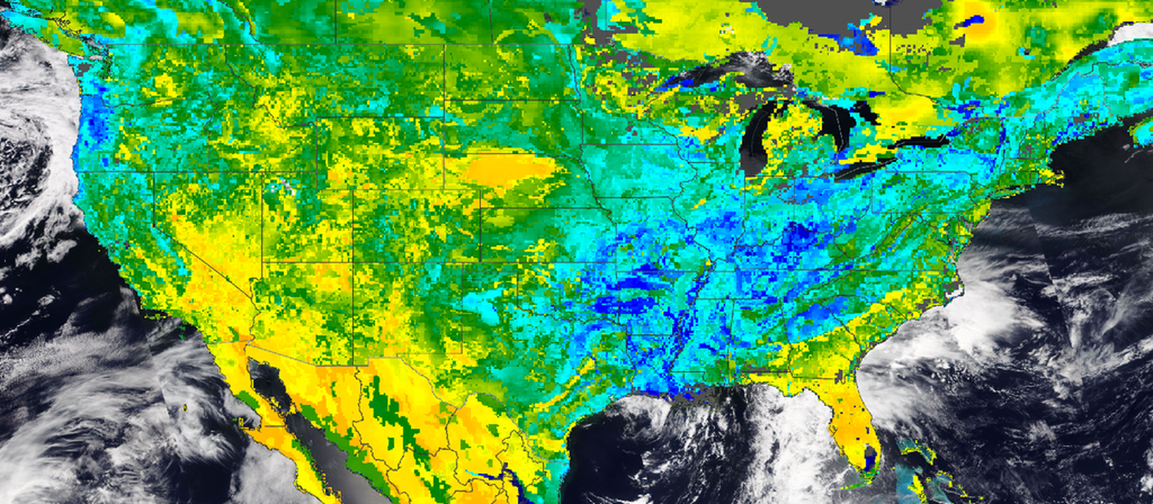 A false-color image from orbit of the USA from the SMAP mission showing drought areas in yellow and orange.