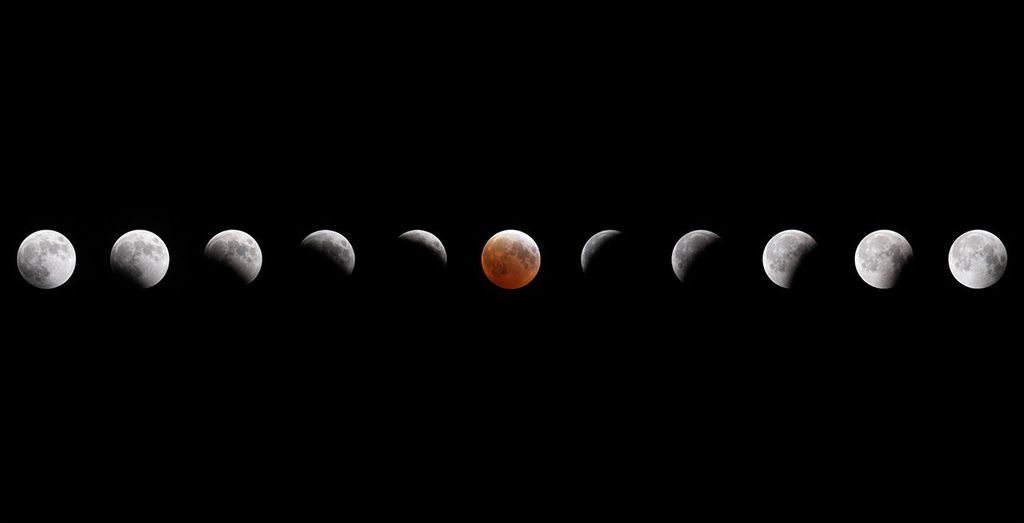 Composite image showing the progression of a lunar eclipse, with the Moon transitioning from full to partial shadow, turning red at totality in the center, and then returning to full brightness.