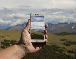 Hand holding a smart phone.