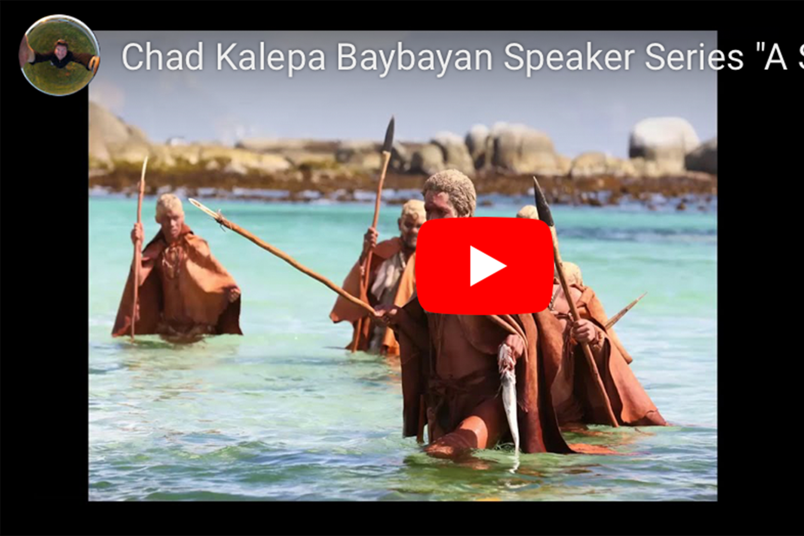 YouTube video play icon with a fishing scene behind it.