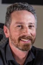 Portrait photo of a smiling man