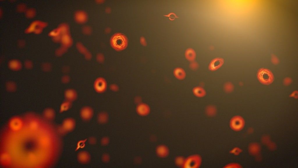 An artist rendition of primordial black holes, this depicts a black background with many small black holes in an orange-red color.