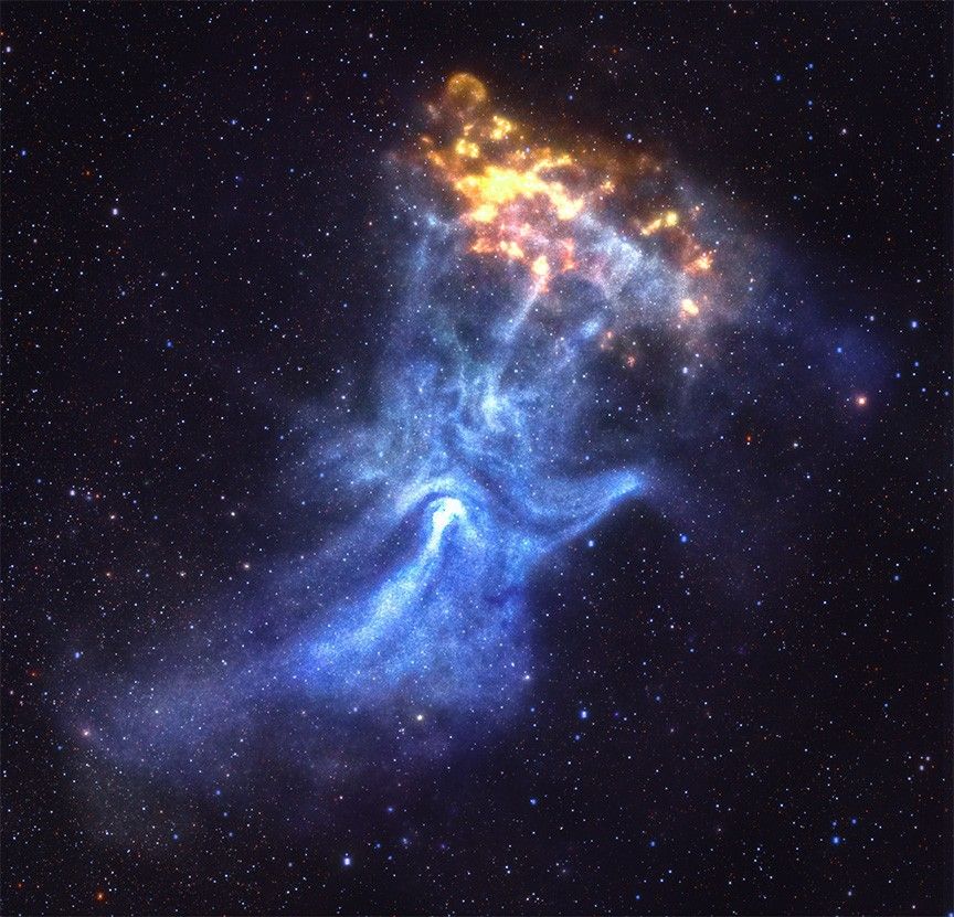 In this composite image, a pulsar, a pulsar wind nebula, and a low energy X-ray cloud combine to create an uncanny scene of a skeletal hand preparing to grab a glowing ember. The hand reaches up from the bottom of the image, the ghostly blue flesh and white bones representing pulsar wind nebula X-rays observed by Chandra. A bright white spot in the wrist is the pulsar itself. Just beyond the hand�s fingertips, near our upper right, is a mottled yellow and orange shape that appears to glow from within. This is the low energy X-ray cloud observed by Chandra.