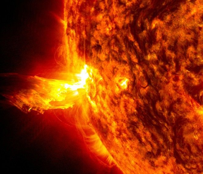 A Coronal Mass Ejection (CME) is a giant explosion on the Sun which ejects plasma out into space. It can take several days to reach Earth.