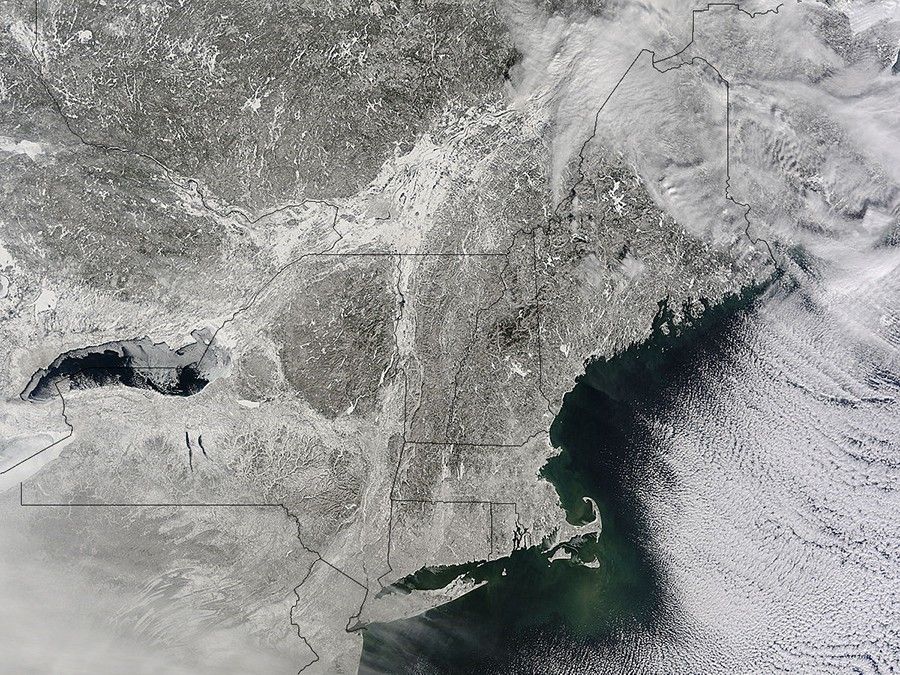 A Satellite image showing the Northeast of the United States blanketed in snow.