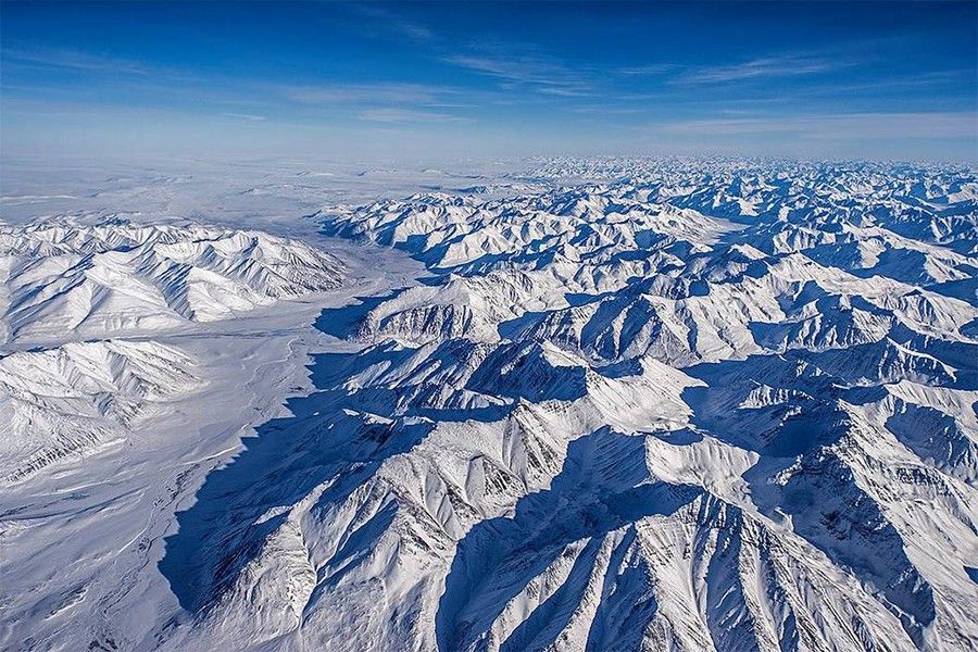 A photo of the snow covered mountains in Alaska's Brooks Range.