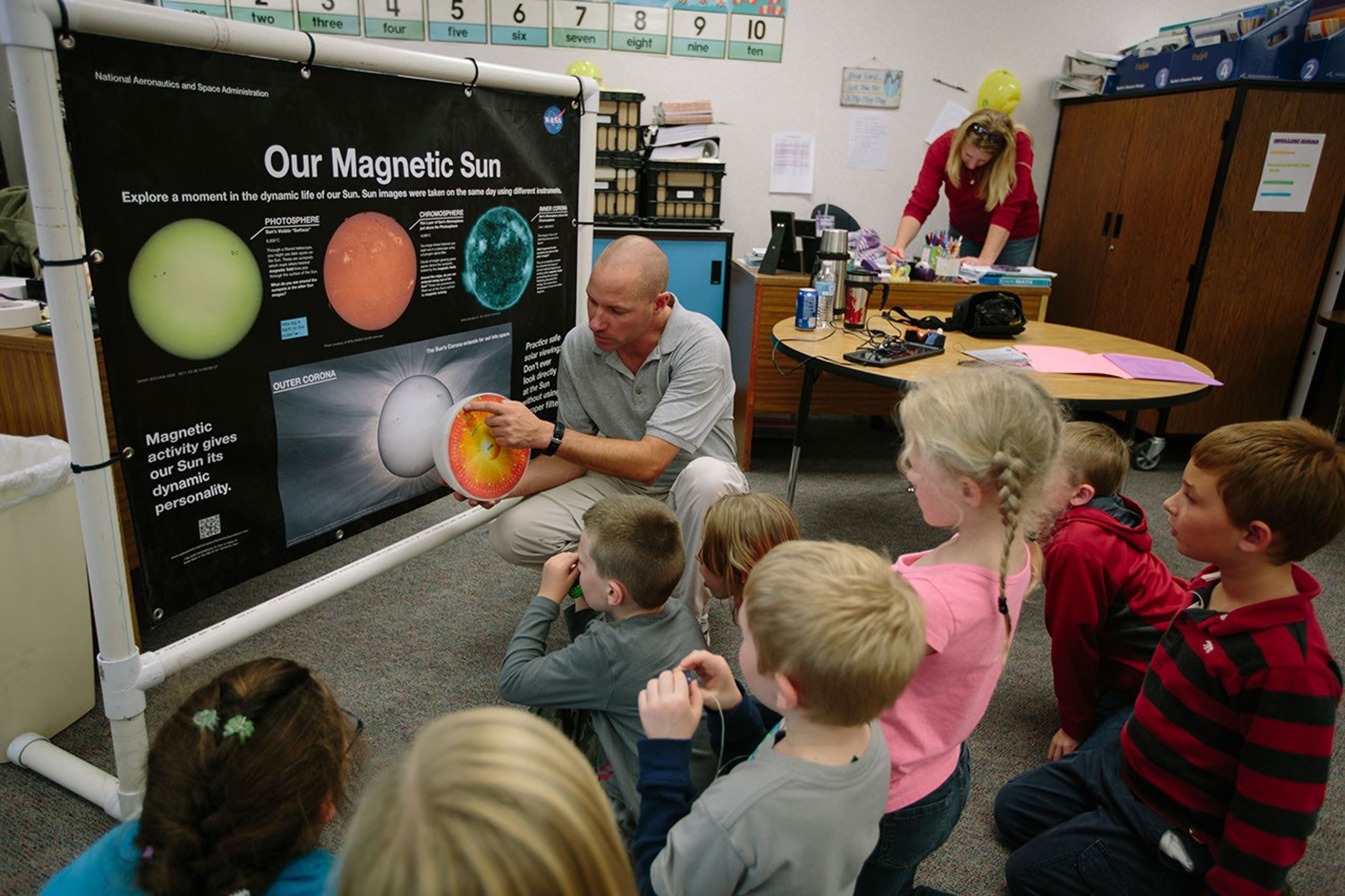 An amateur astronomer teaching children about the Sun using the 'Our Magnetic Sun' toolkit.