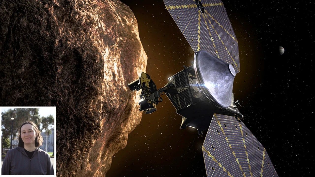 An artist rendition of the Lucy spacecraft exploring a rocky brown asteroid with Jupiter in the far background. An inset image of Alena Gavrilenko is in the bottom left.