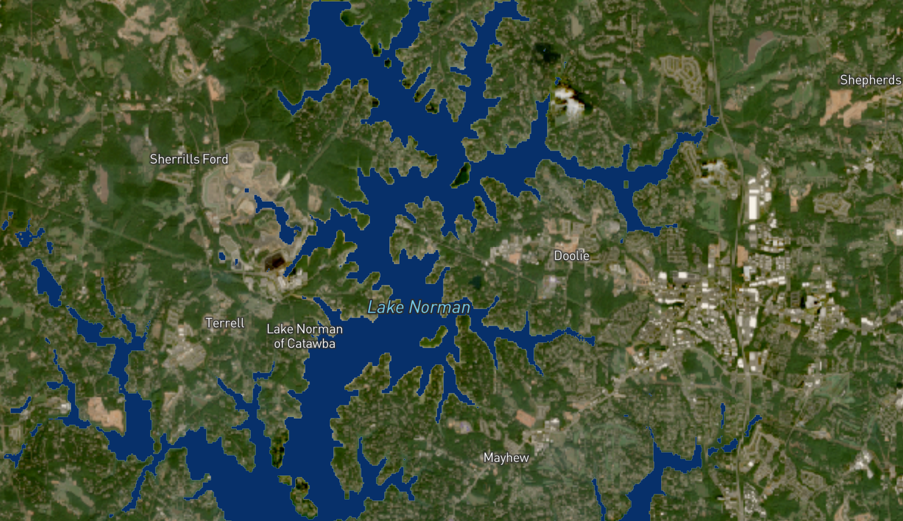 Flooding around Lake Norman in North Carolina caused by Hurricane Helene on October 7, 2024. The blue areas of the image are the Prithvi foundation model demo’s prediction of the extent of the flooding.