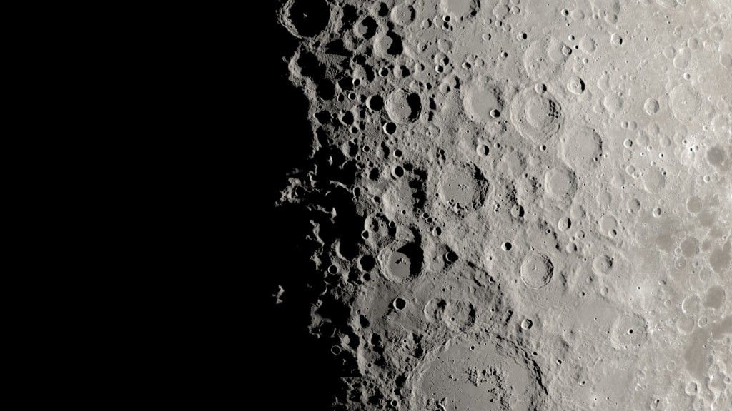 A zooming overhead view of Mons Mouton in natural color.