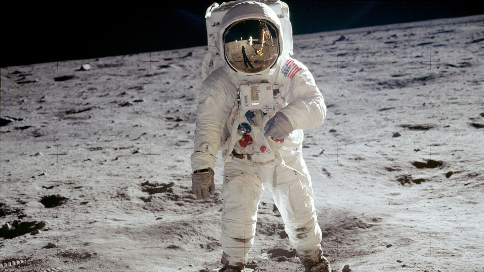 Astronaut Neil Armstrong took this photo of Aldrin. Armstrong can be seen in the reflection of Aldrin’s helmet visor.