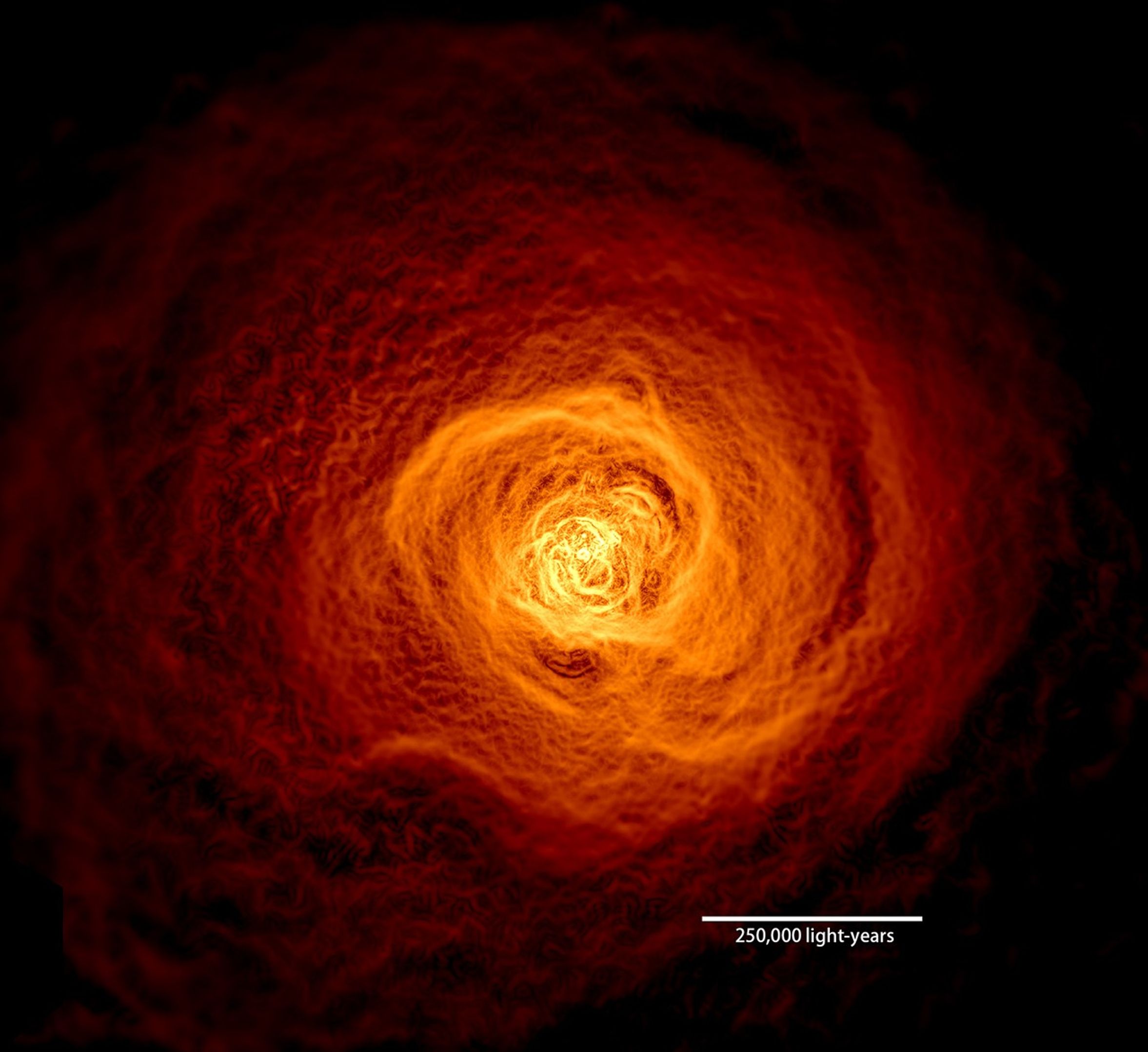 This X-ray image of the hot gas in the Perseus galaxy cluster was made from 16 days of Chandra observations. Researchers then filtered the data in a way that brightened the contrast of edges in order to make subtle details more obvious. An oval highlights the location of an enormous wave found to be rolling through the gas.Credit: NASA's Goddard Space Flight Center/Stephen Walker et al.