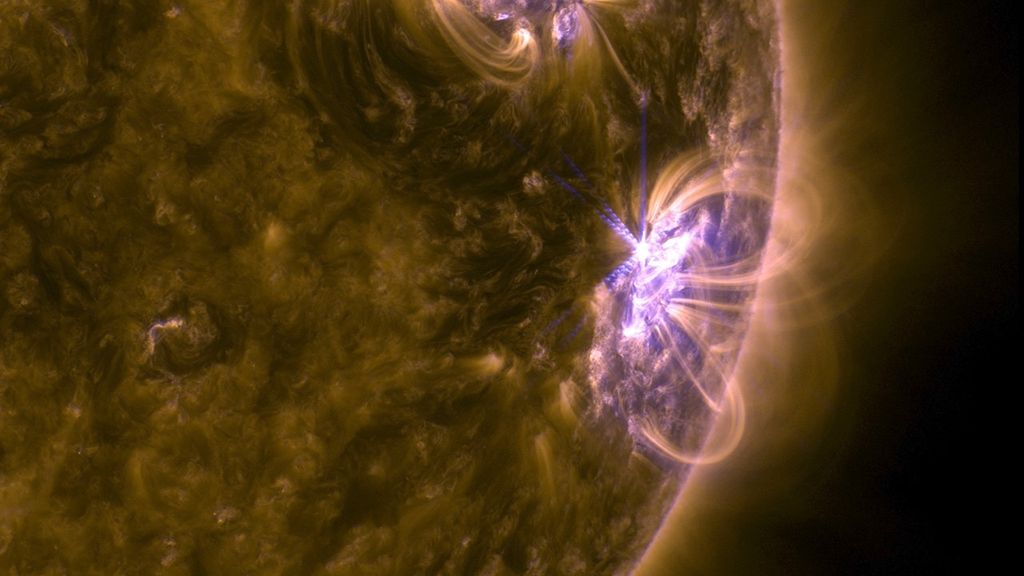NASA’s Solar Dynamics Observatory captured this image of an M8.1 solar flare – as seen in the bright area on the right – on Sept. 8, 2017. The image is a blend of extreme ultraviolet light in the 131 and 171 angstrom wavelengths. Credit: NASA/GSFC/SDO