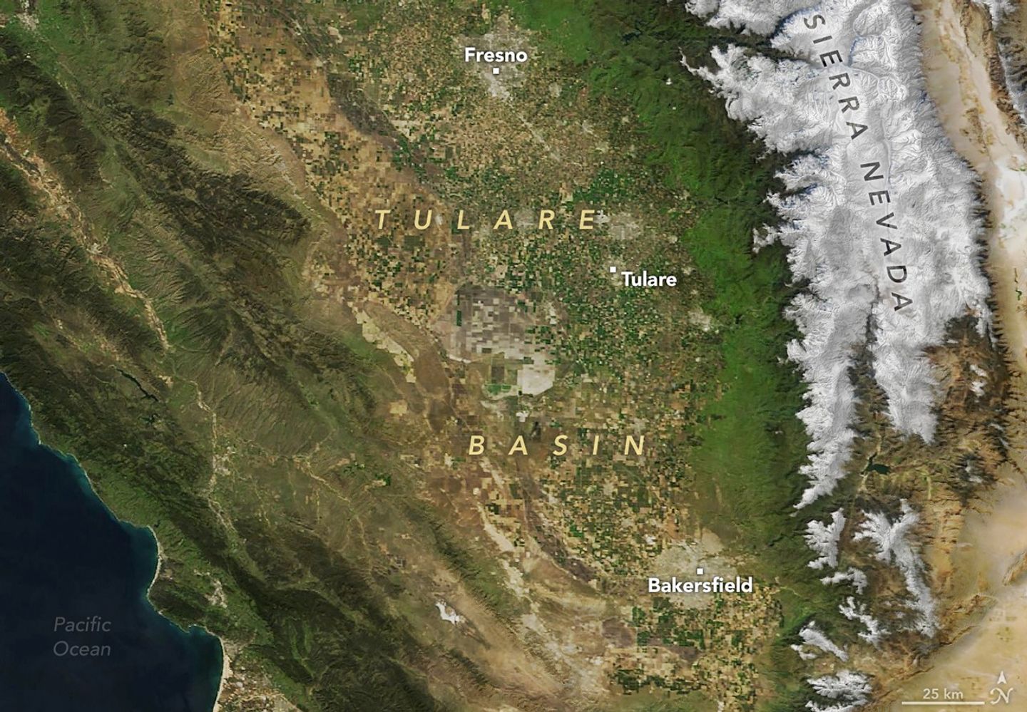 Satellite image of the Tulare Basin area in Southern California, showing a mix of foothills and farmlands.