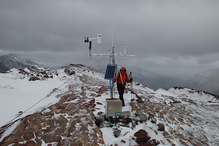 Weather stations are set up throughout Glacier National Park in Montana to monitor and collect weather data. These stations must be visited periodically for maintenance and to add or remove new research devices. Credit: GlacierNPS, CC BY 2.0, via Wikimedia Commons