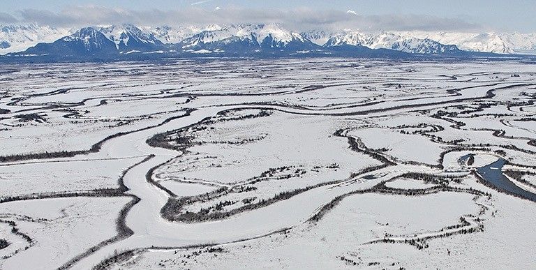 Even after the ground surface freezes in the fall, Alaskan soils can continue to emit carbon.
