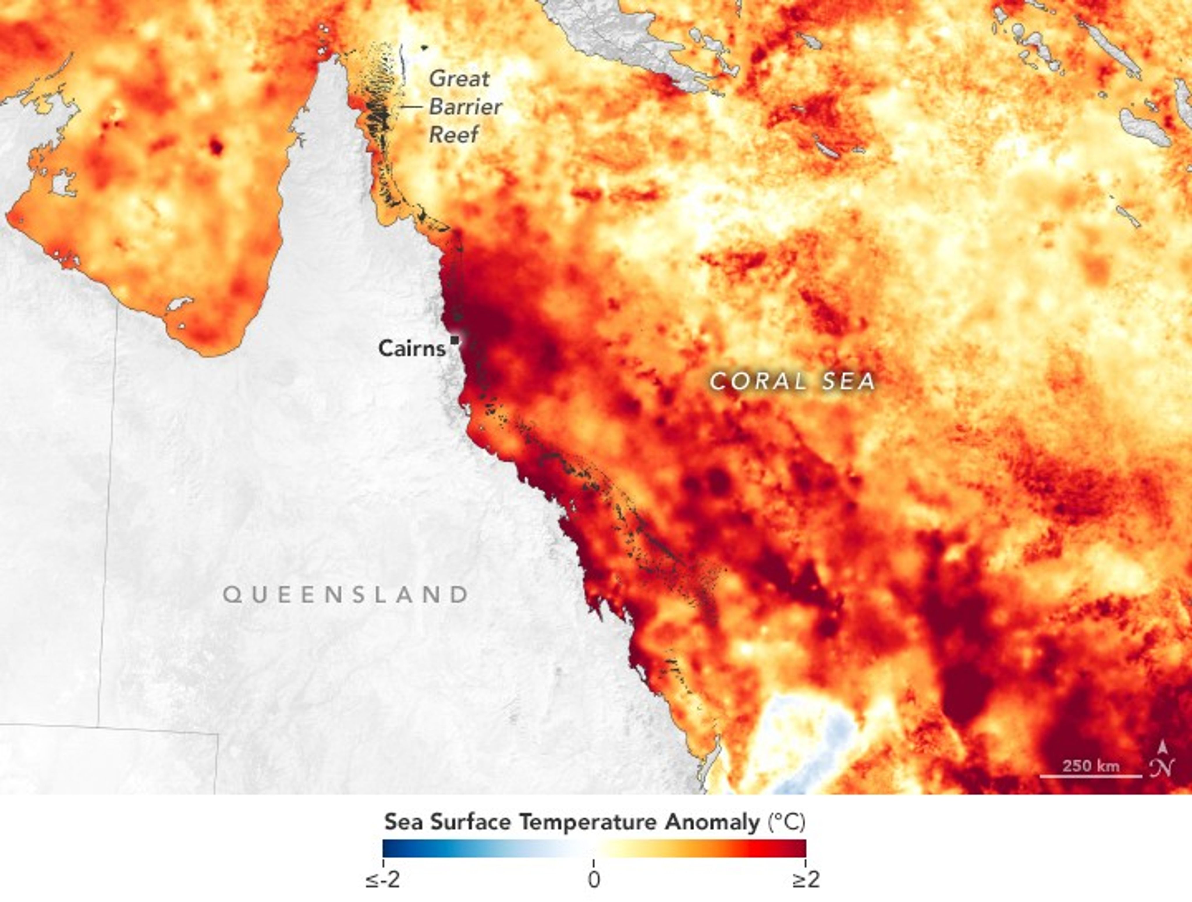Vanishing Corals: NASA Data Helps Track Coral Reefs 3 Sea surface temperature anomalies off the coast of eastern Australia in March 2022 compared to the average from 2003 to 2014. There is mainly yellows and red colors in all of the water locations shown, meaning warmer than normal sea temperatures. There are patches of bright red and dark red off the coast of Cairns where the Great Barrier Reef is located in part. The Great Barrier Reef is labeled near the top, Cairns is labeled toward the bottom of the tip of the continent, which is labeled Queensland. The Coral Sea is labeled to the left of the image.