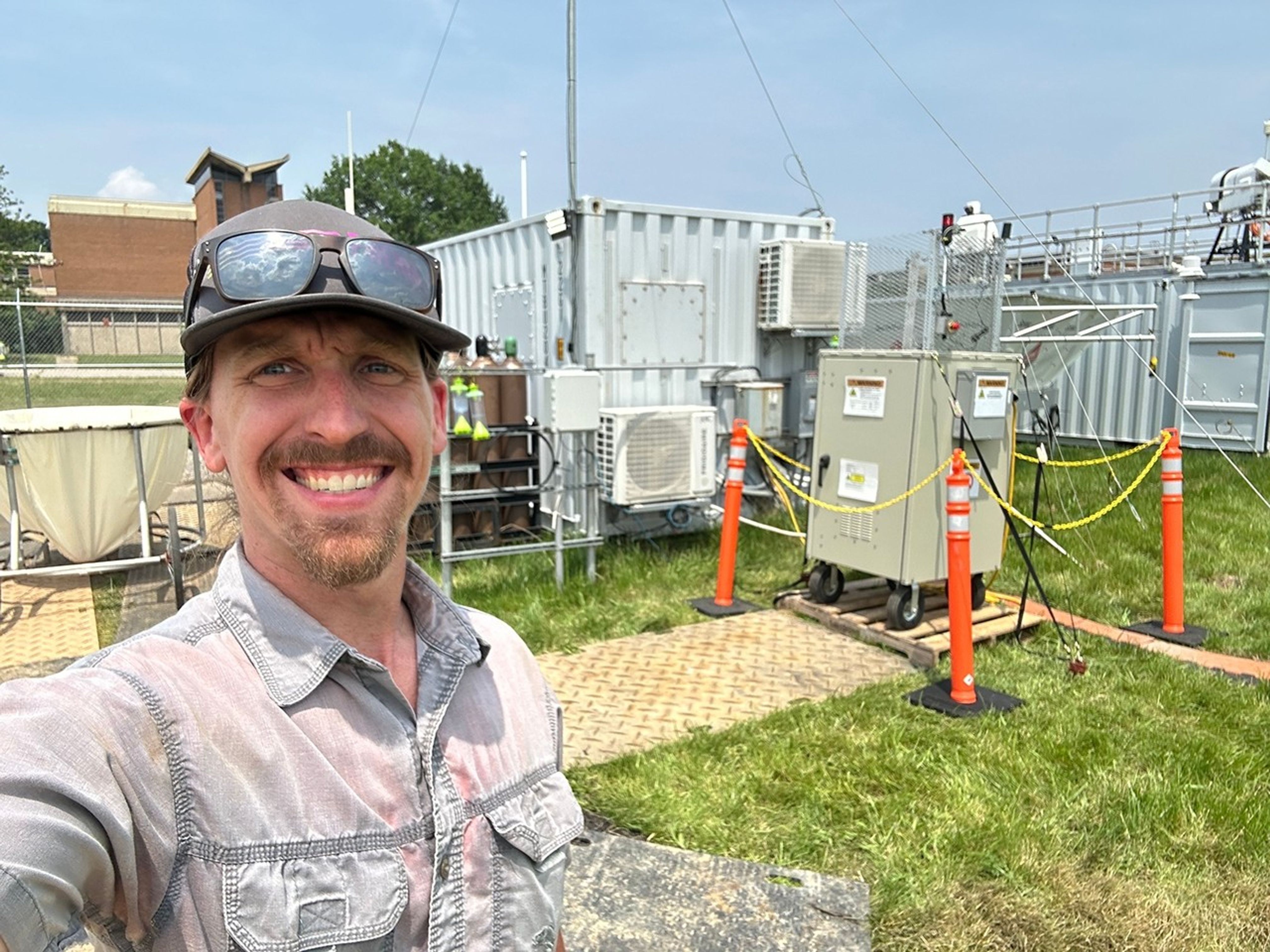 John Sullivan selfie image in front of industrial equipment