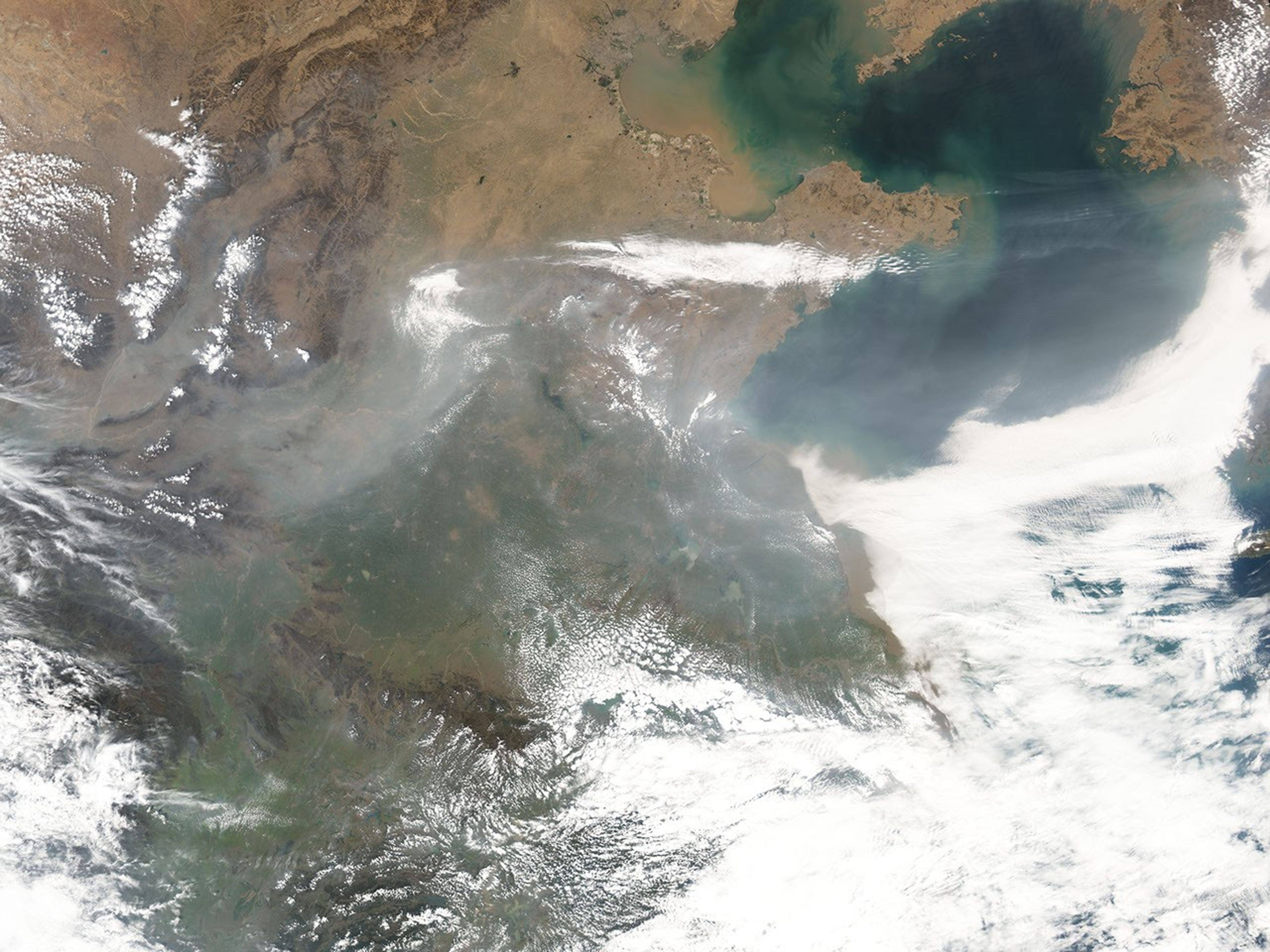 Dust and Haze Blow Across China