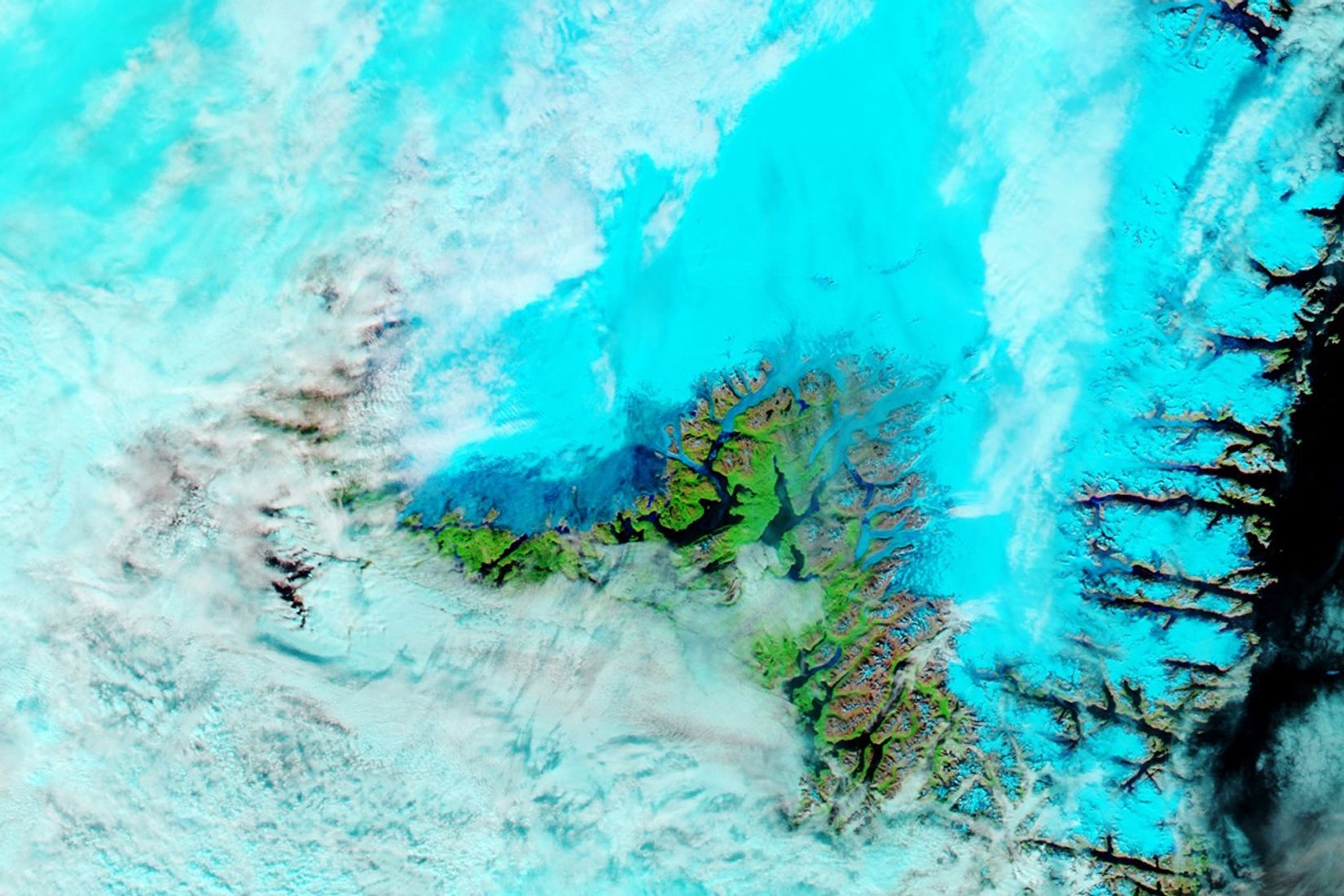 Rain and Warmth Trigger More Melting in Greenland