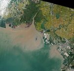 A Changing Estuary Lined With Red