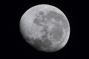 A view of a nearly full moon, as seen from the International Space Station.