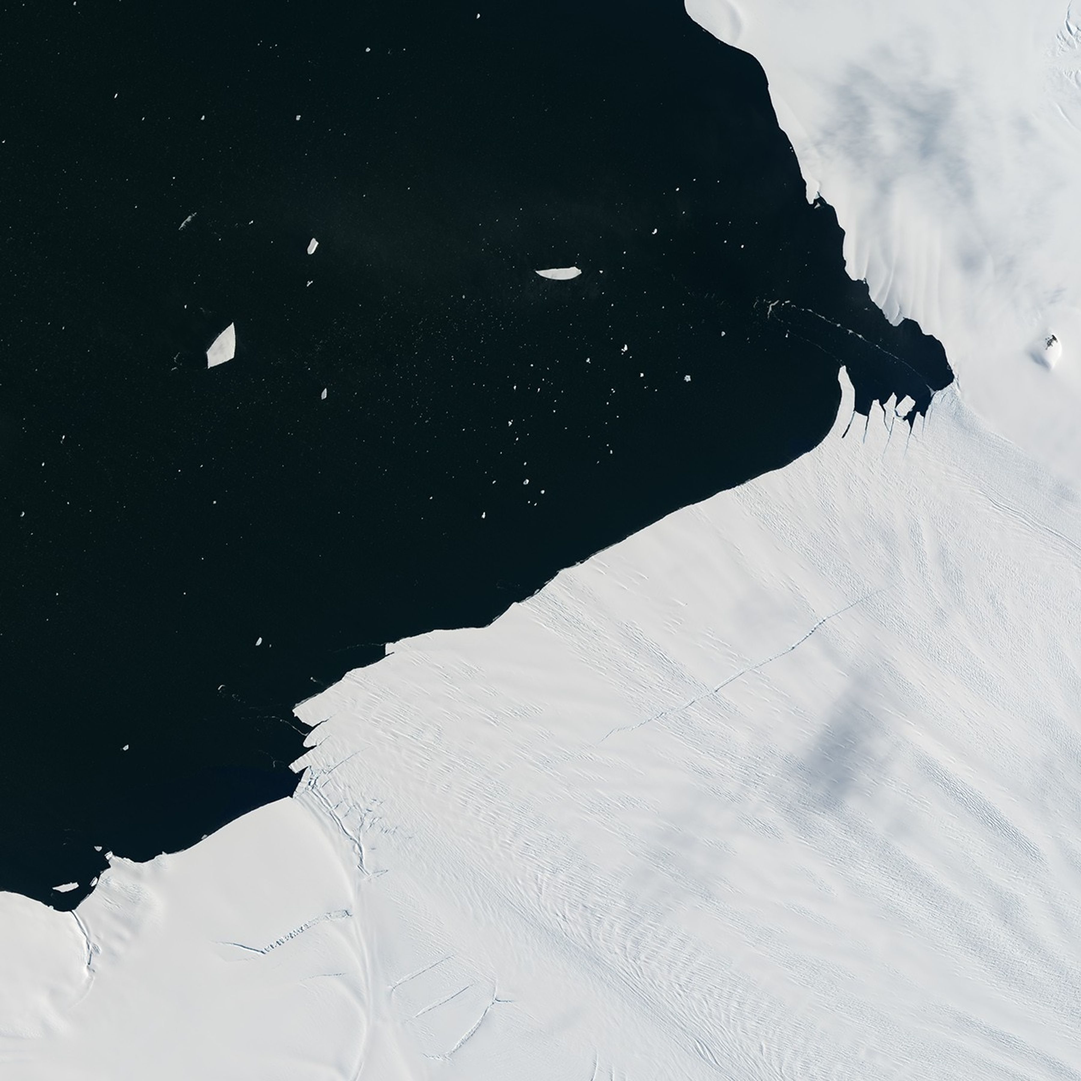 Glacial “Aftershock” Spawns Antarctic Iceberg