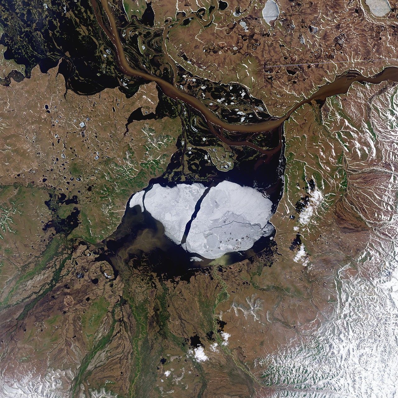 Going, Going, Gone: Summer Clears Ice from Krasnoye Lake