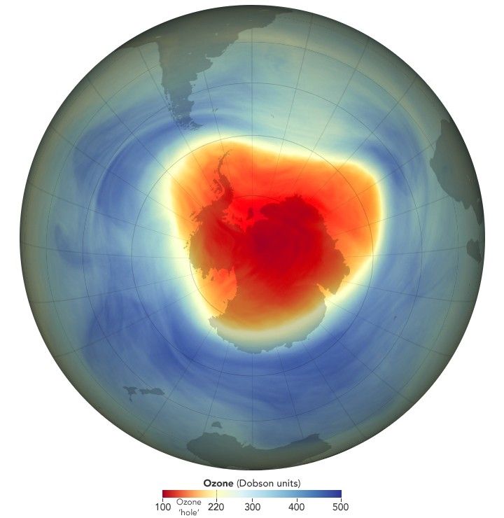 A map of Ozone coverage over shows the region over Antarctica in a light yellow to orange and a light red indicative of an Ozone hole.