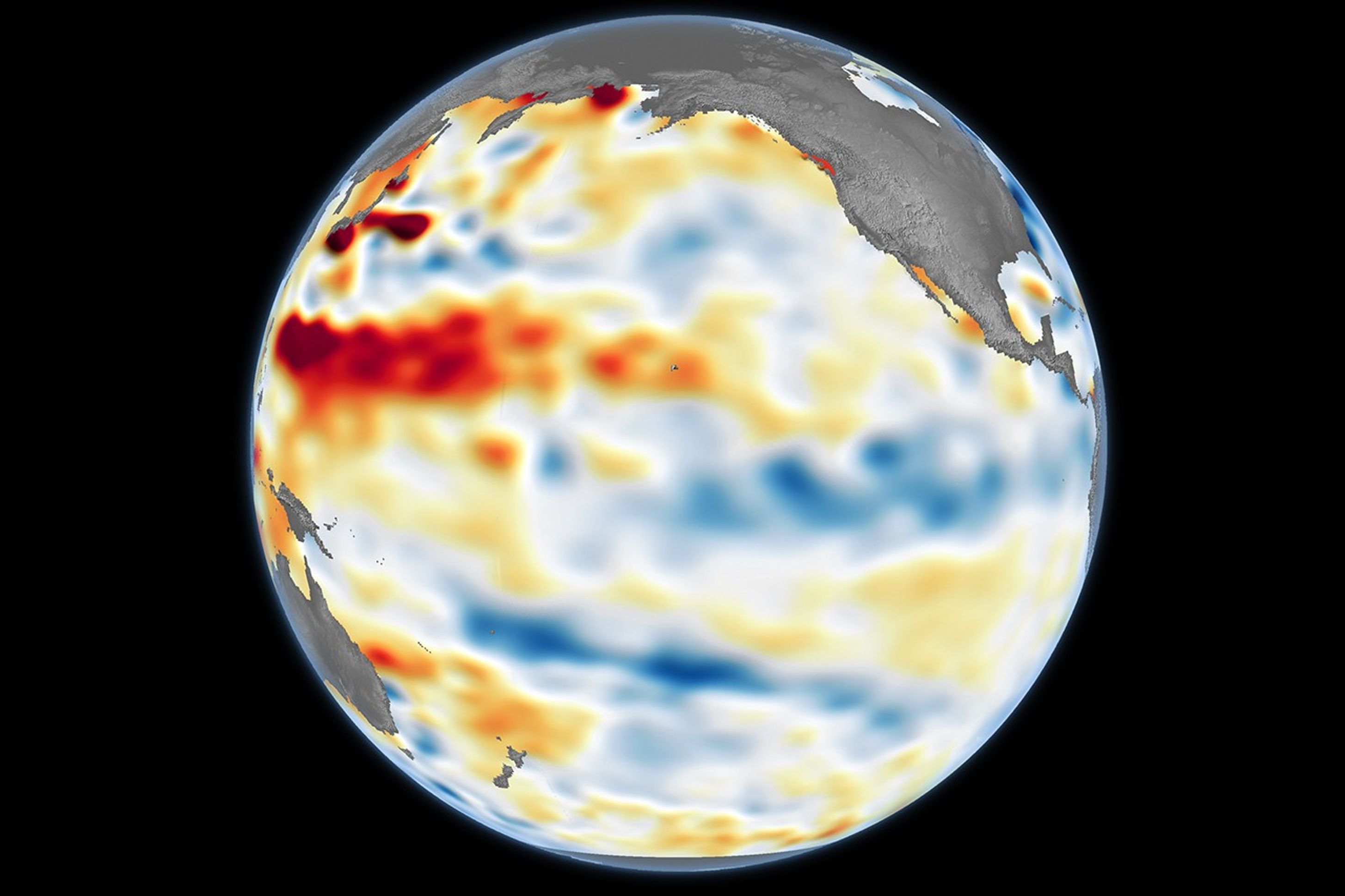 A data visualization of Earth centered on the equatorial Pacific Ocean shows a strip of blue spanning part of the ocean basin’s middle, indicating where sea levels are lower than normal.