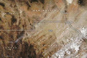 The U.S. Mexico border region is shown with a country and state border overlay including Chihuahua in the lower right Sonora in the lower left Arizona in the upper left and New Mexico at the top. Texas appears in the center right as well. El Paso is labeled at the meeting point of the borders between Texas, Chihuahua, and New Mexico. Las Cruces is labeled up and left of El Paso in New Mexico. Smoke emanates from a single spot in Sonora, it, dust, and clouds all stream diagonally up and right from the point of origin.