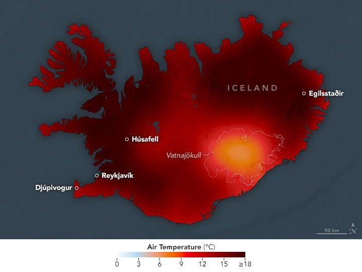 Iceland is shown with an air temperature overlay in shades of light blue to near black orange. The gradient shifts from blue to orange at 3.5 degrees C and reaches it's darkest at 18 degrees C or more. The entire map is within the orange hue range, Egilsstaðir and the top right is all in the darkest shade with only the Vatnajökull area appearing a light orange shade. Húsafell and Reykjavik on the left side of the island country are also in a band of deep orange. On the tip of a peninsula near Reykjavik the town of Djúpivogur is in a medium orange shade