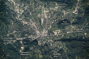 An astronaut aboard the International Space Station photographed Roanoke, Virginia, a city in the Blue Ridge Mountains. The mountains are a segment of the greater Appalachian Range, which extends from northern Georgia to southern Pennsylvania. The Roanoke River flows from the northwest to the southeast and is visible along the southern portion of the city.