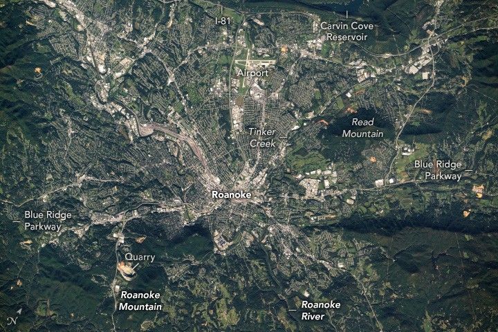 An astronaut aboard the International Space Station photographed Roanoke, Virginia, a city in the Blue Ridge Mountains. The mountains are a segment of the greater Appalachian Range, which extends from northern Georgia to southern Pennsylvania. The Roanoke River flows from the northwest to the southeast and is visible along the southern portion of the city.