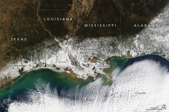 Clouds cover the lower Gulf of Mexico in this image of the Gulf Coast. Houston the coastal portion of these states and more inland Alabama appear white due to snow cover. This includes Houston, New Orleans, and Pensacola.